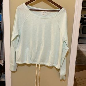 Shirt with cinch tie around bottom